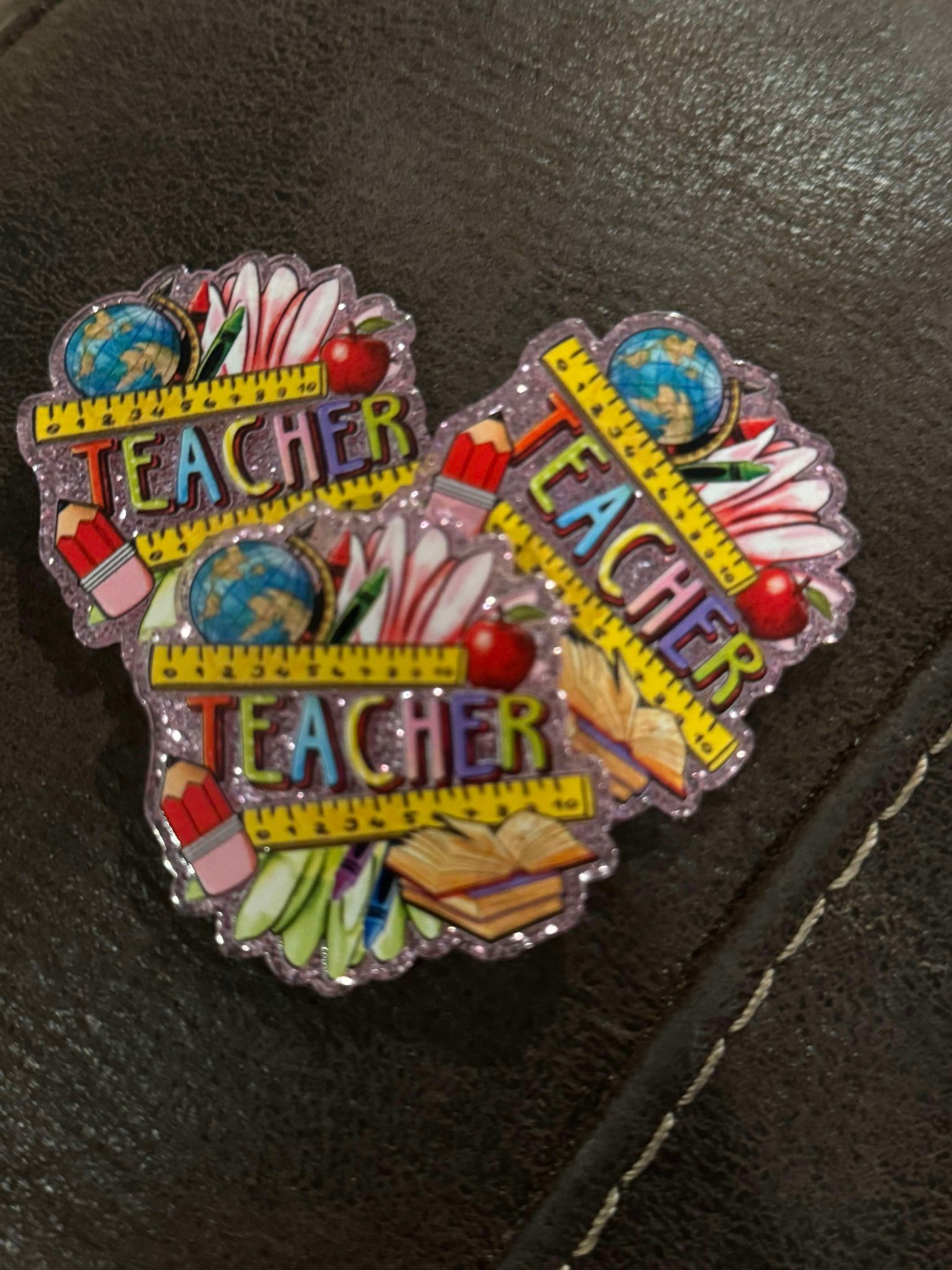 Teacher with and globe, acrylic piece, for badges, pens, earrings etc