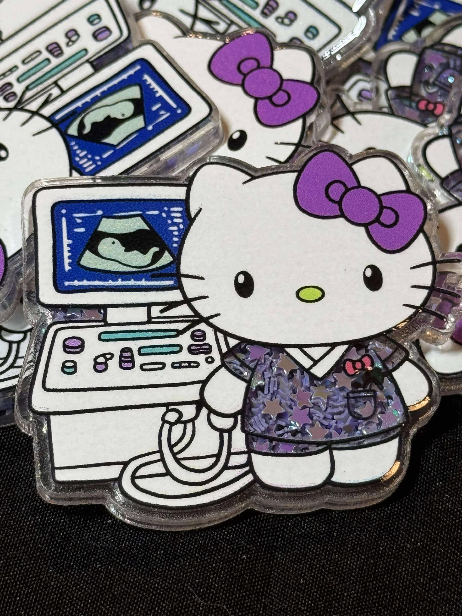 Ultrasound cat, shakeable glitter acrylic piece, for badges, pens, earrings etc