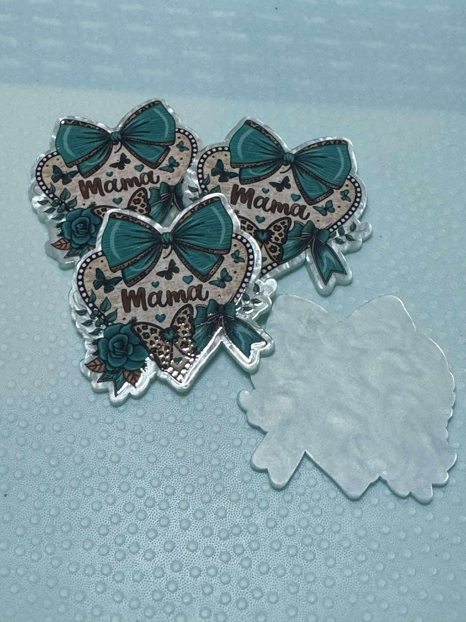 Mama teal bow acrylic piece, for badges, pens, earrings etc