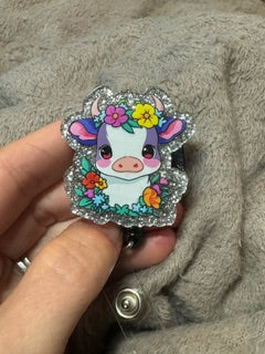 Cow with purple spots, badge reel with retractable badge clip